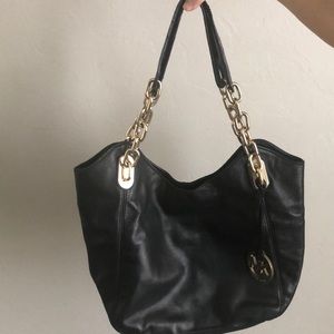 Michael Kors black shoulder bag with gold details